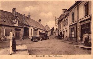 Carte postale d'une rue du village.
