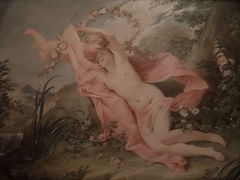 Vénus allongée attire à elle l'Amour